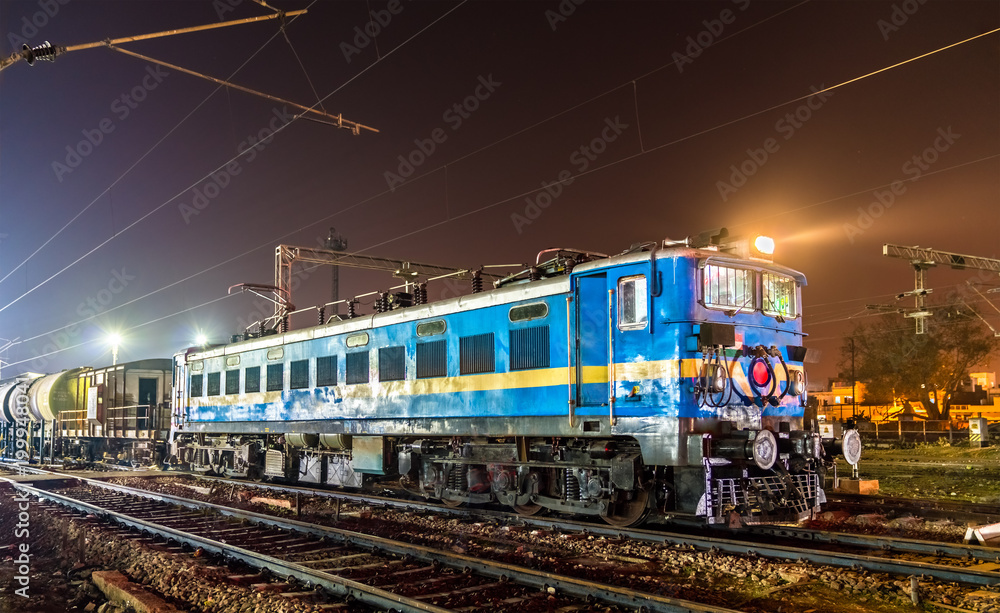 Locomotive with a freight train at Agra Cantonment railway station. India