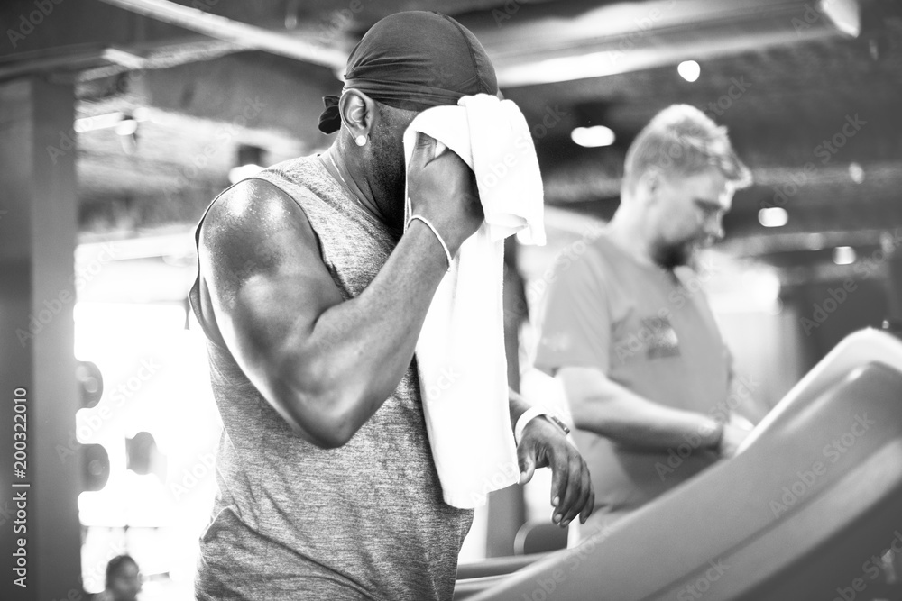 People exercising at fitness gym