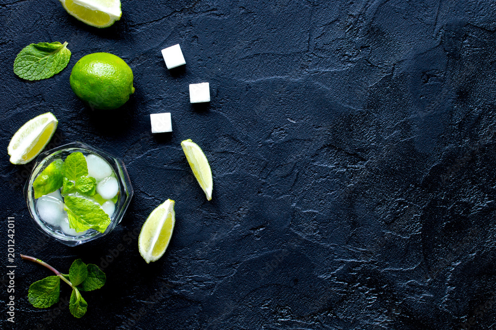 making mojito on dark background top view