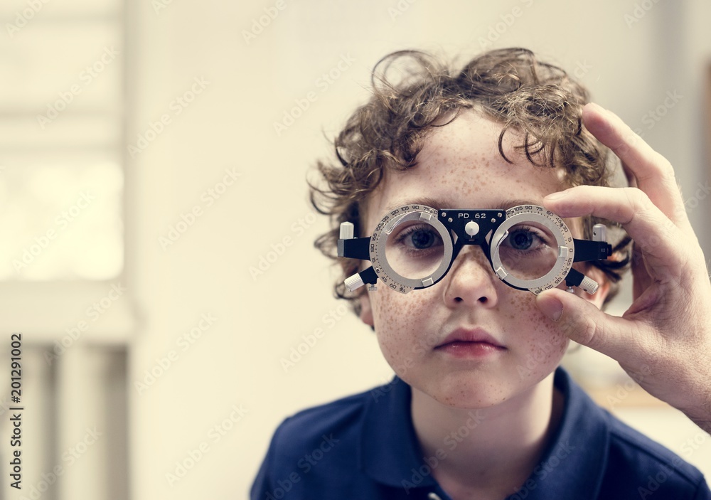 Little boy getting his eyes checked