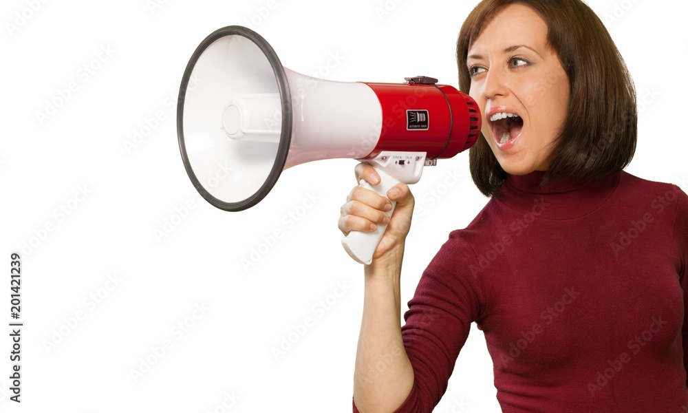 Portrait of woman holding megaphone