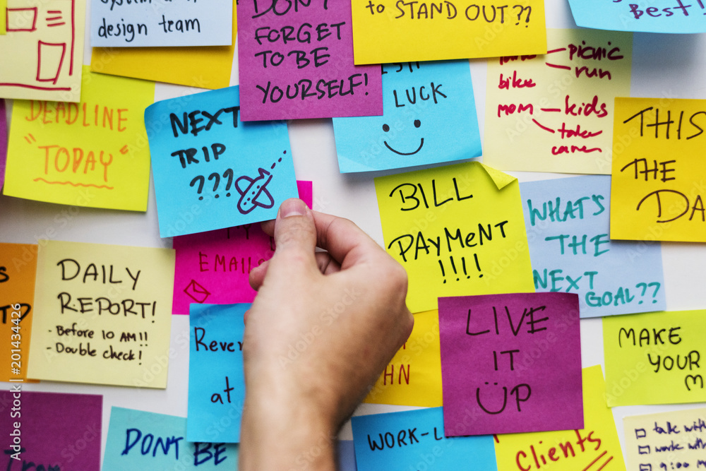 Sticky notes on an office wall