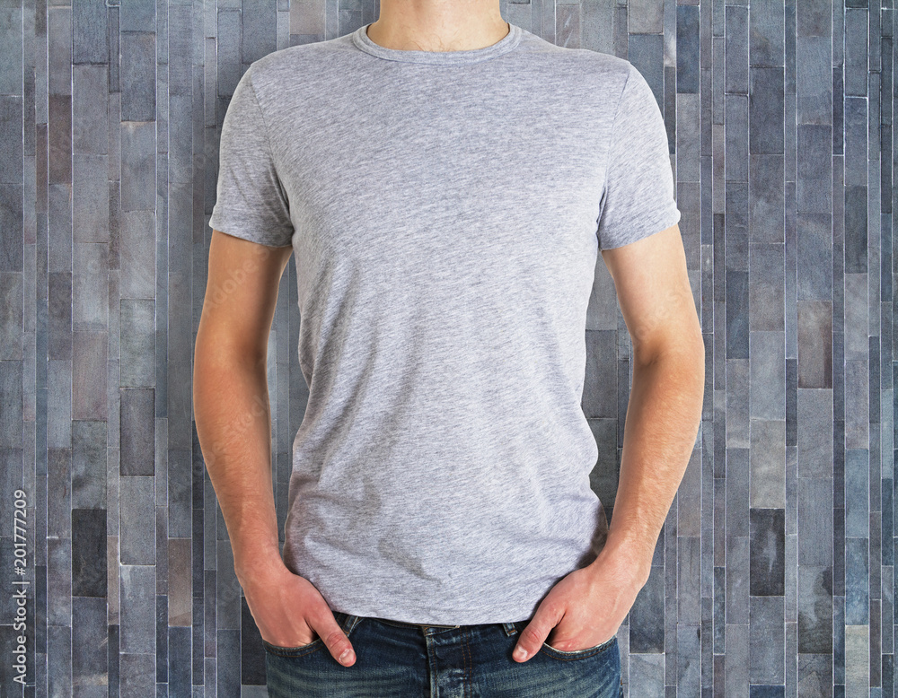 Man wearing clean shirt on wooden background