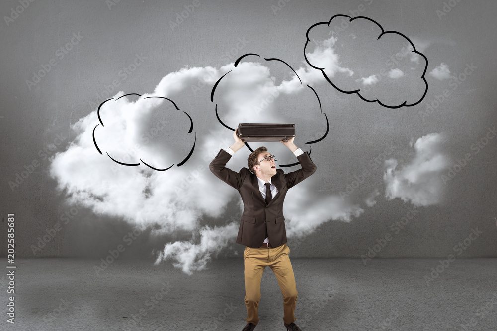 Young geeky businessman holding briefcase against clouds in a room