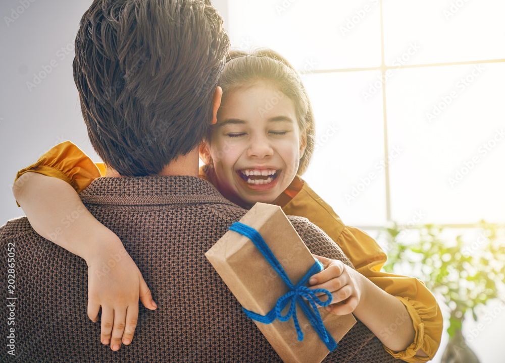 daughter congratulating dad