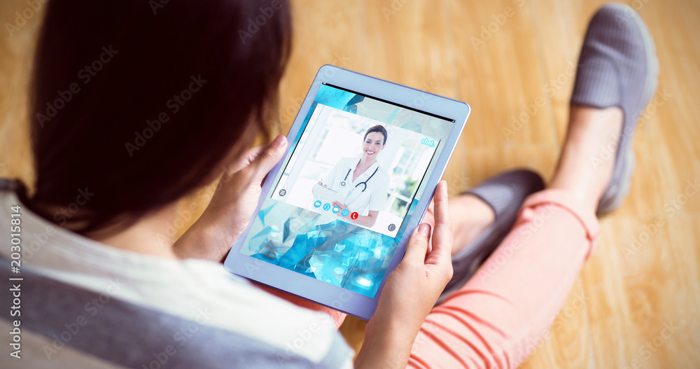 View of video chat app against woman using her tablet