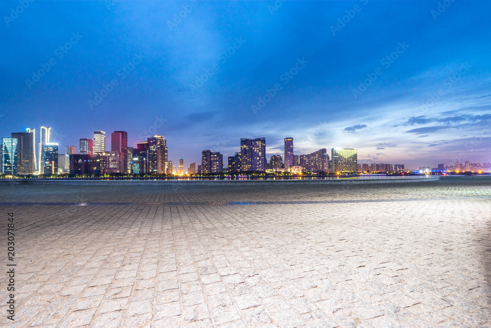 empty marble floor with city skyline