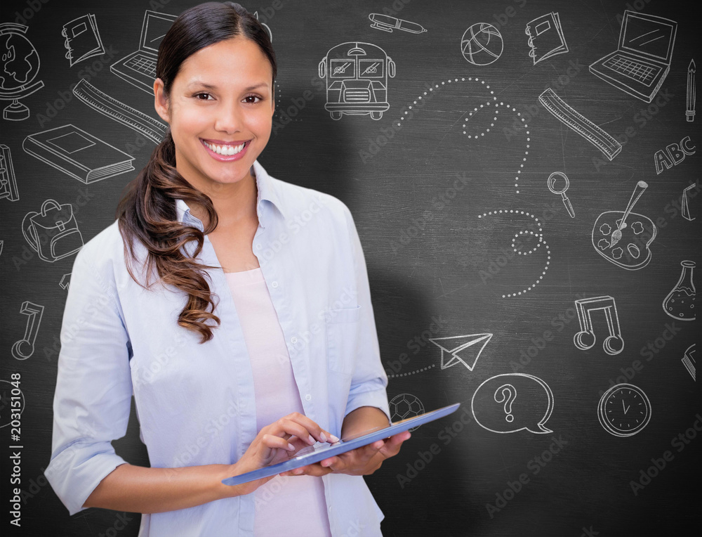 Woman using tablet pc against black background