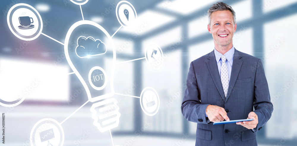 Portrait of smiling businessman using digital tablet against modern room overlooking city