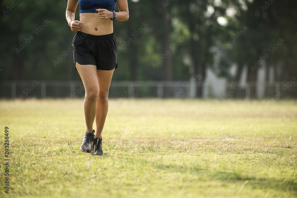 young asia woman jogging in morning