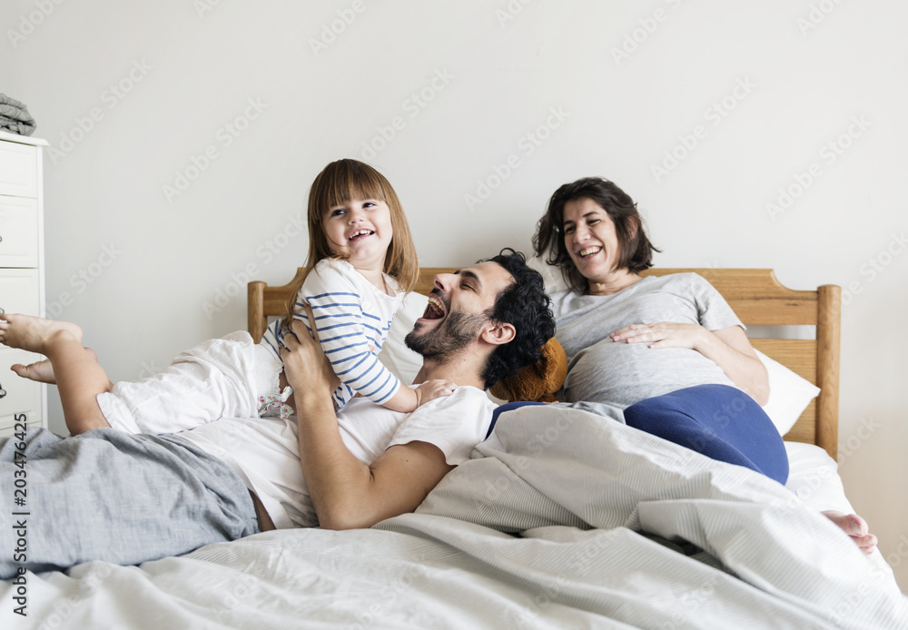 Pregnant family spending time together