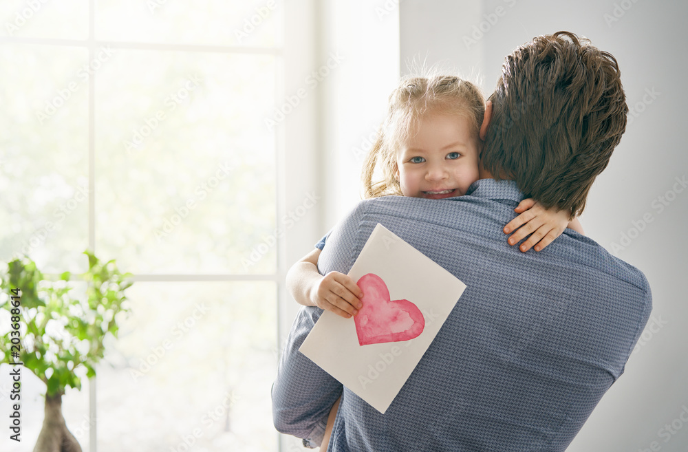 daughter congratulating dad