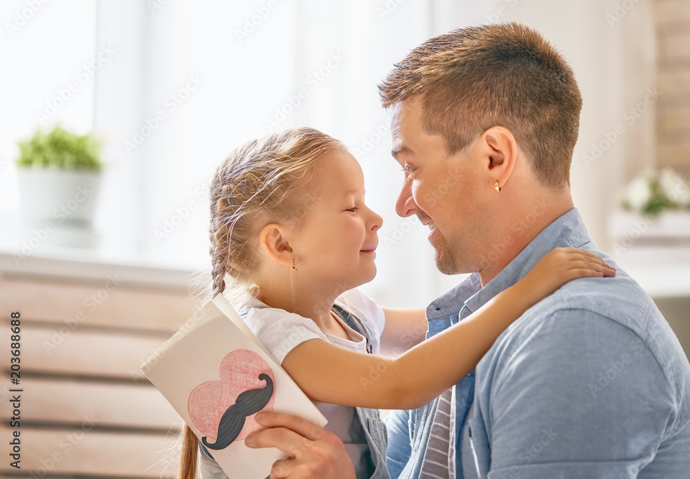 daughter congratulating dad