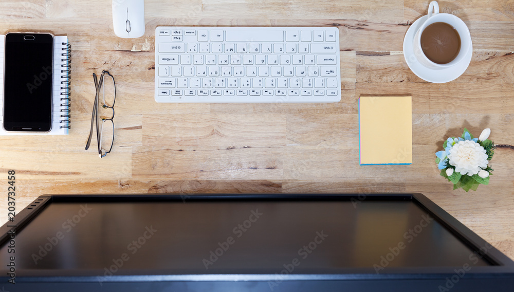 Business desk table, Working on Wooden Table with computer,smartphone,tablet,notebook concept Busine