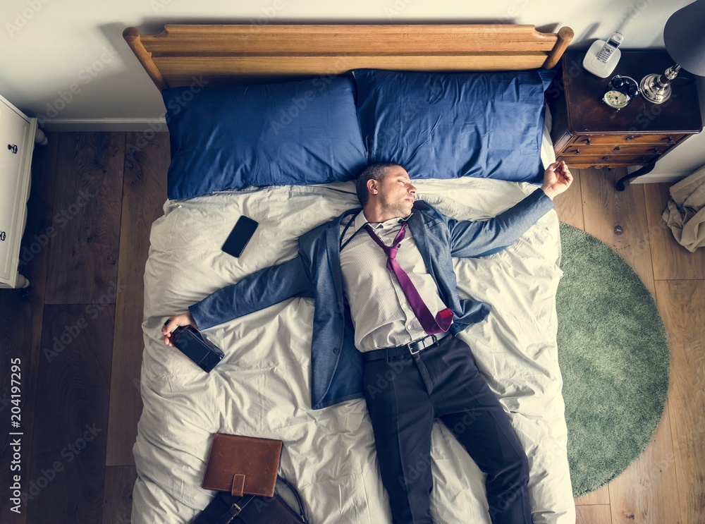 Drunk business man falling asleep as soon as he came back home