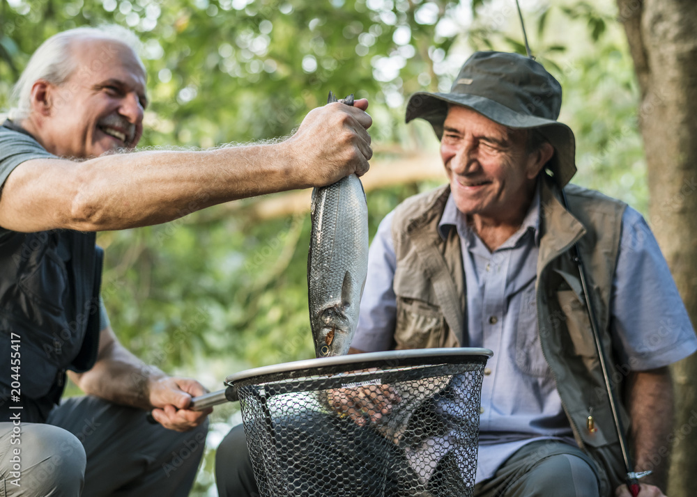 Fisherman with a freshly caught fish