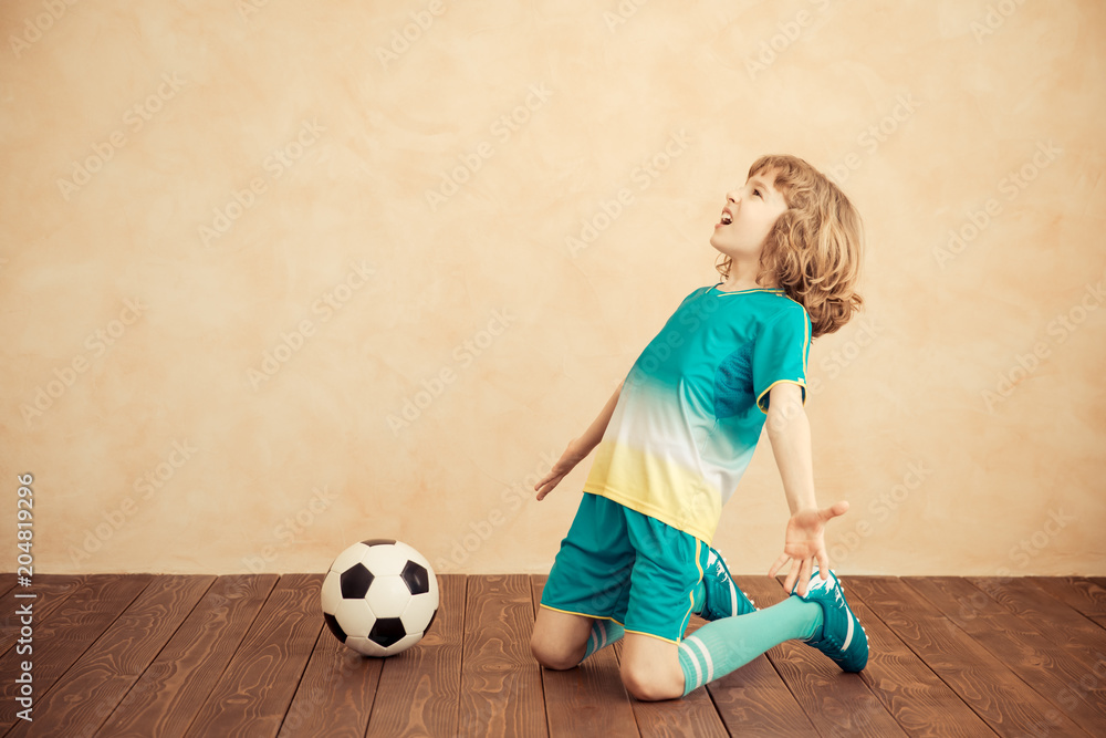 Child is pretending to be a soccer player