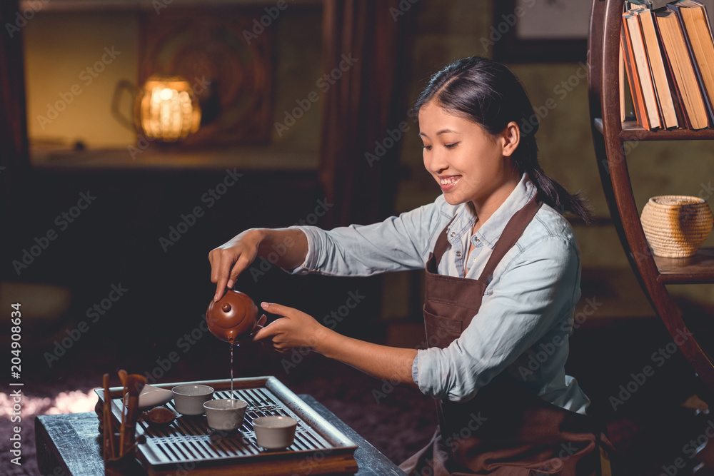 Attractive girl at a tea ceremony