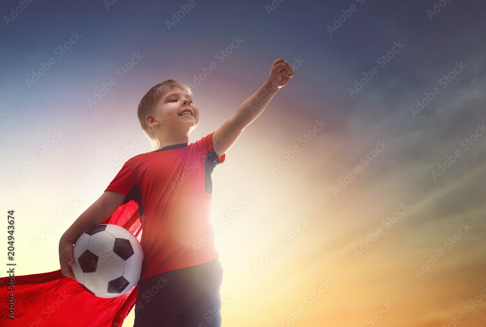 Boy playing football