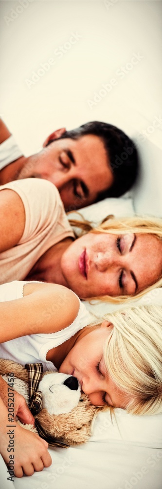 Calm family sleeping together