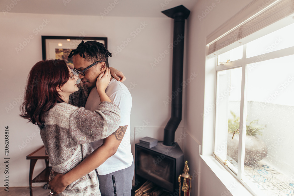 Romantic couple together at home