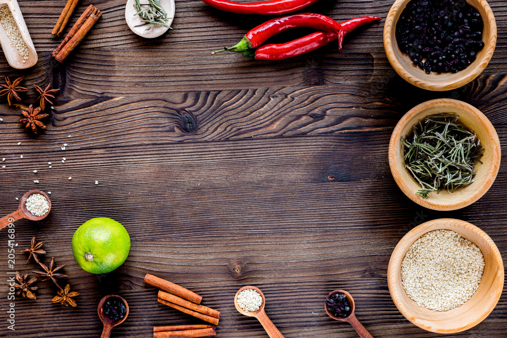 Flat lay herb and spices on rustic kitchen background space for 