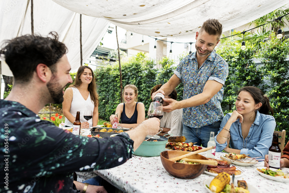 Group of diverse friends enjoying summer party together