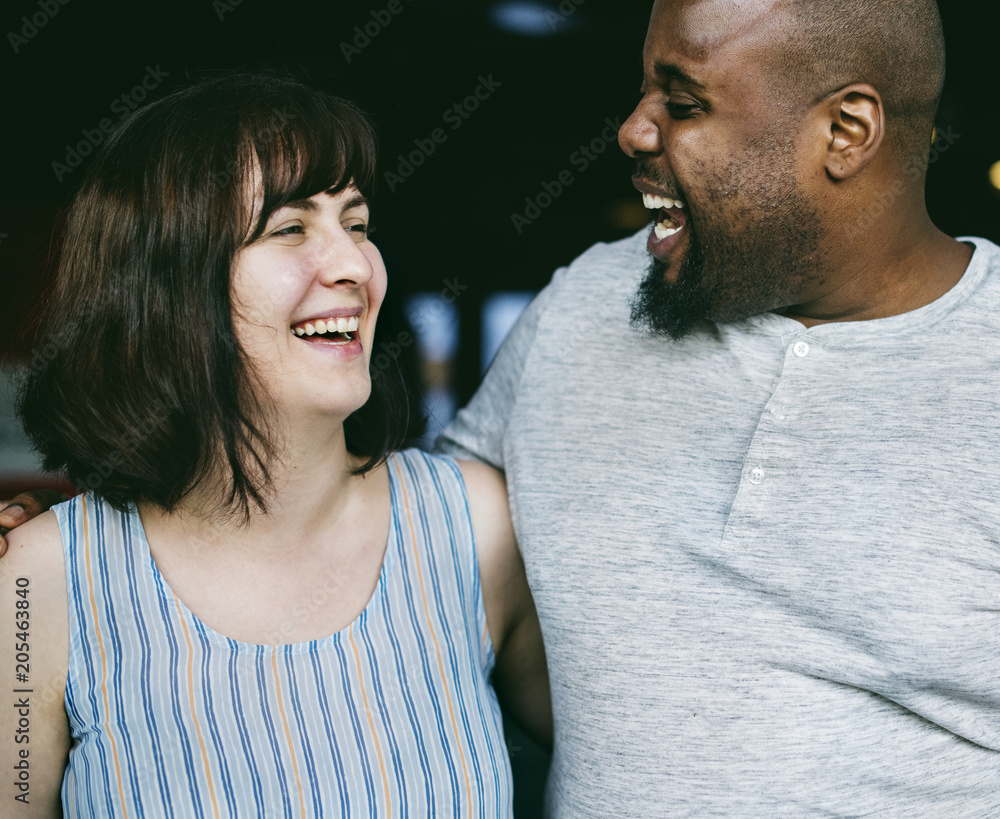 Happy couple laughing together