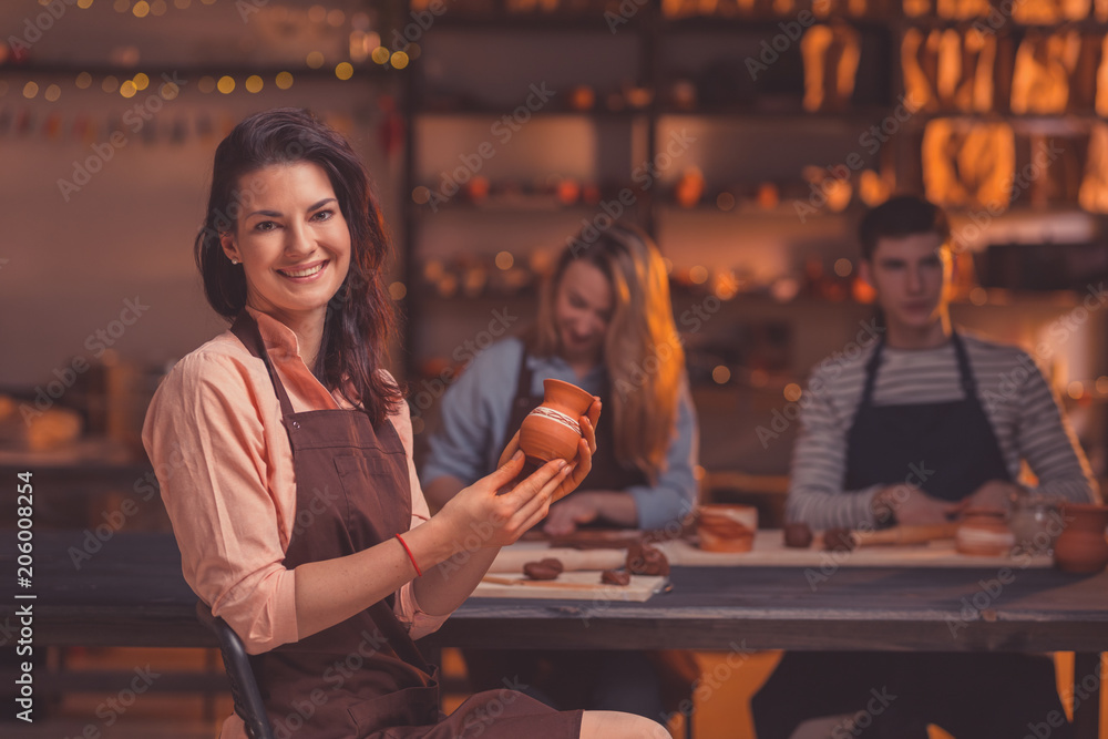 Attractive woman in pottery