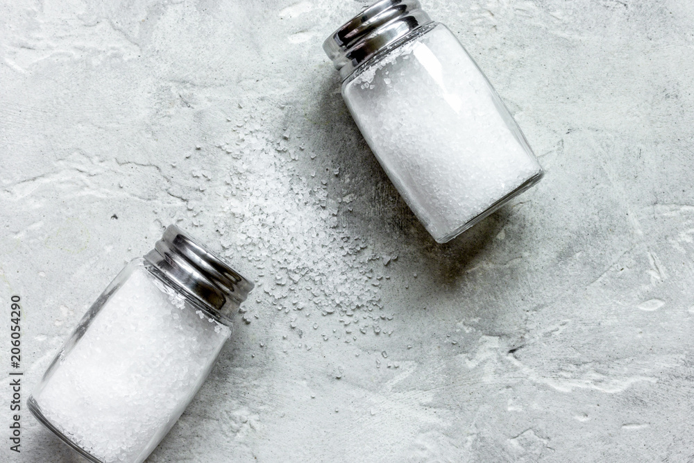 Cooking set with salt on stone background top view mock up