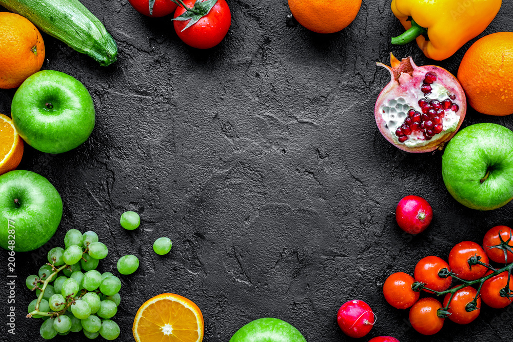 fruits and vegetables for healthy dinner on dark background top 