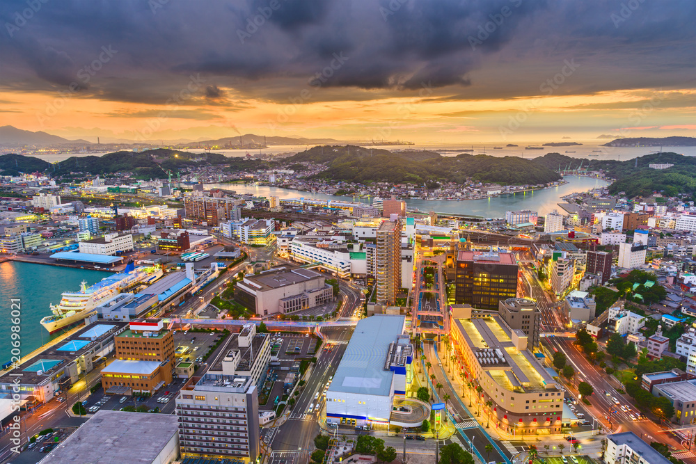 Shimonoseki, Yamaguchi, Japan town skyline at the harbor during dusk.