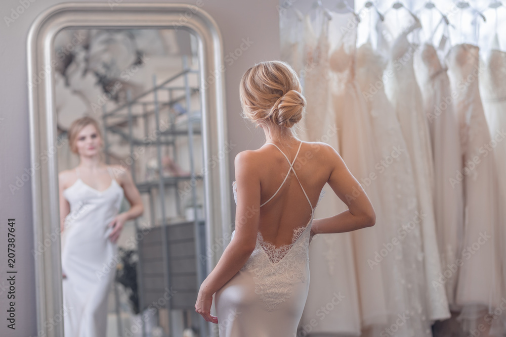 Beautiful bride at the mirror