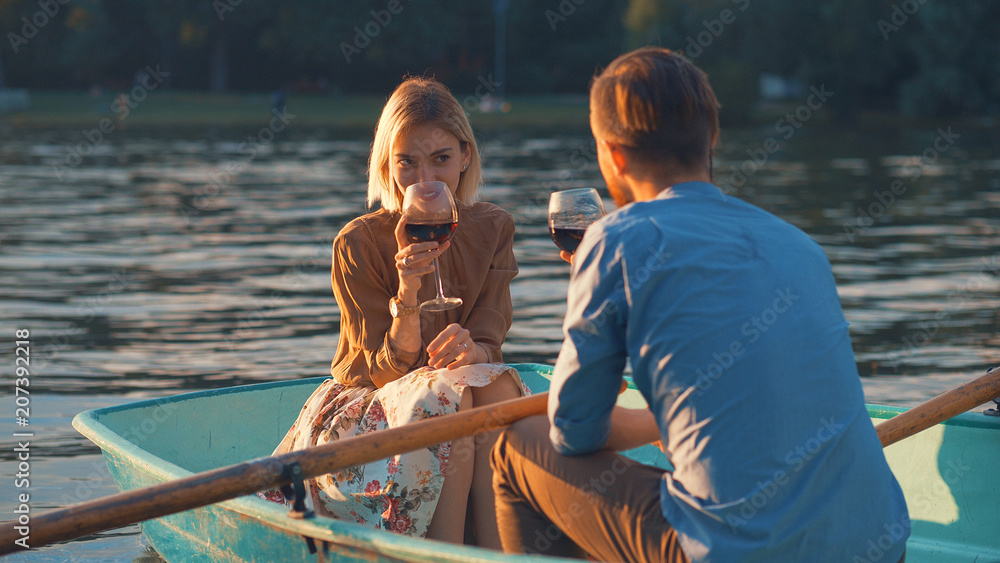 Young couple with a glass of wine