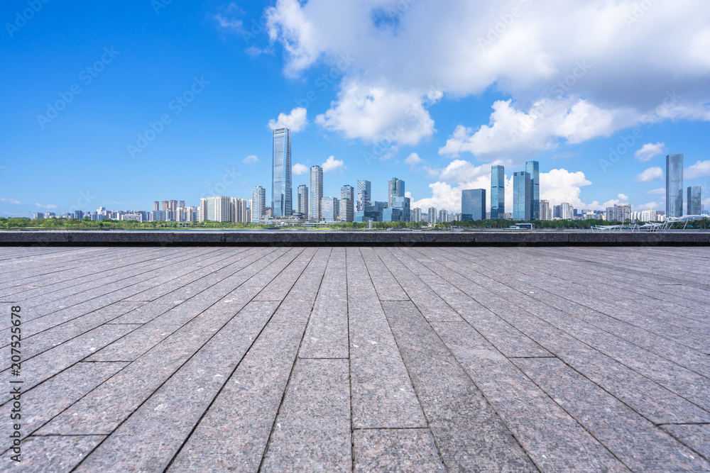 city skyline with empty square