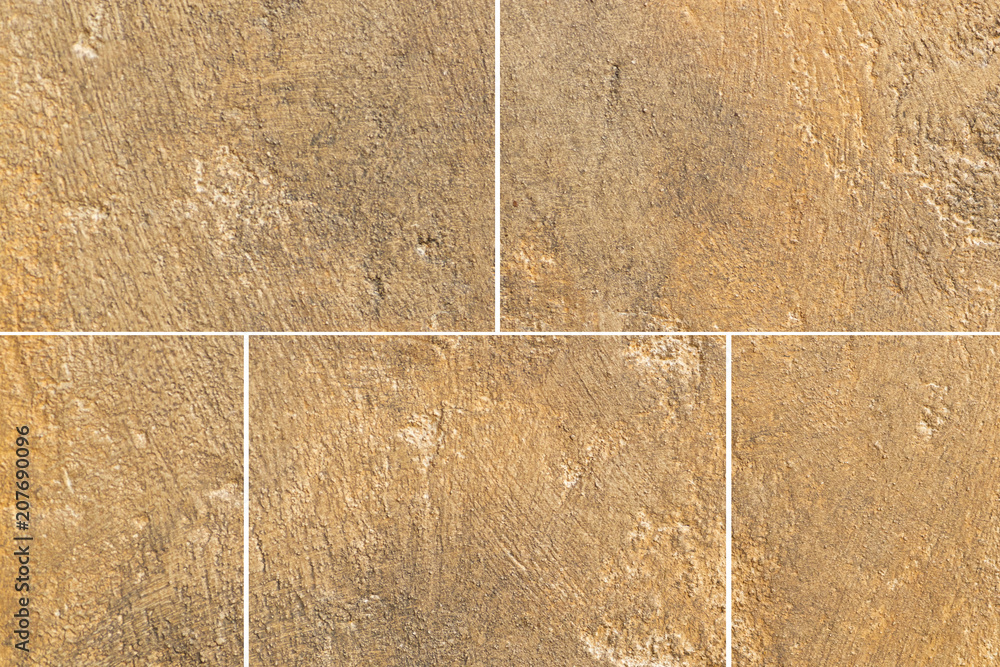 Brown stone wall tile pattern and background seamless