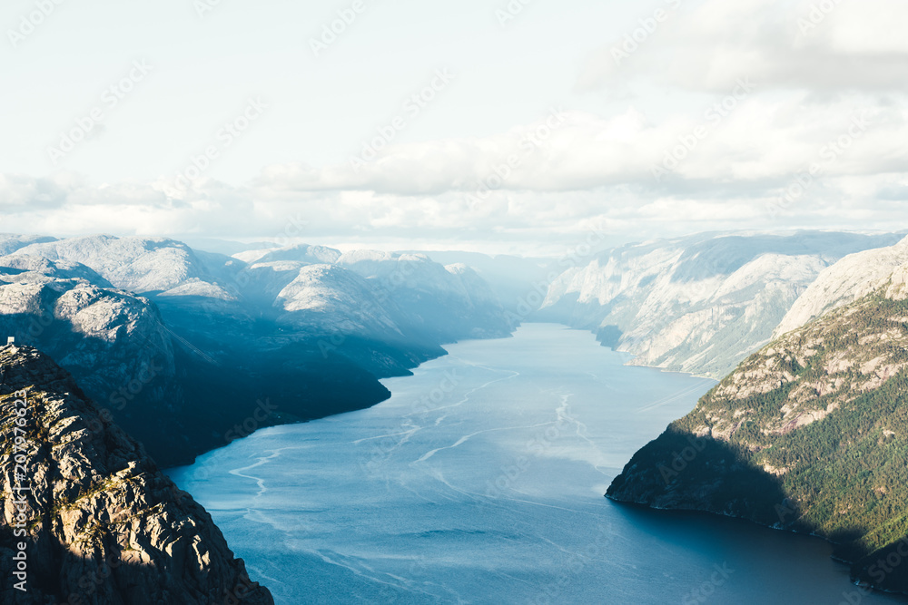 Colourful sunrise on Preikestolen (pulpit-rock) - famous tourist attraction in the municipality of F