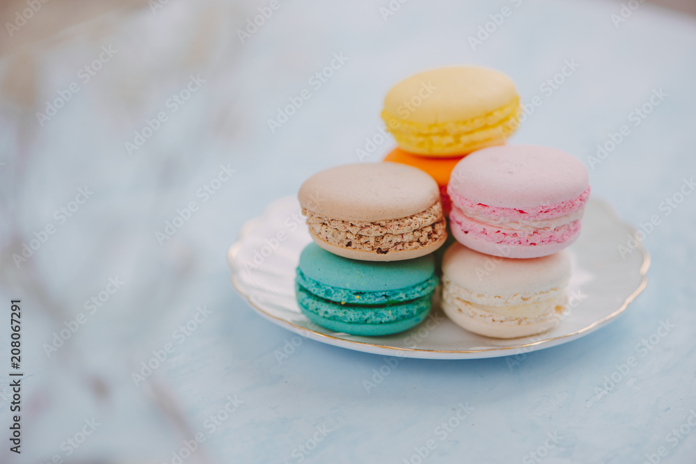 Delicious french dessert. Colorful pastel cake macaron or macaroon