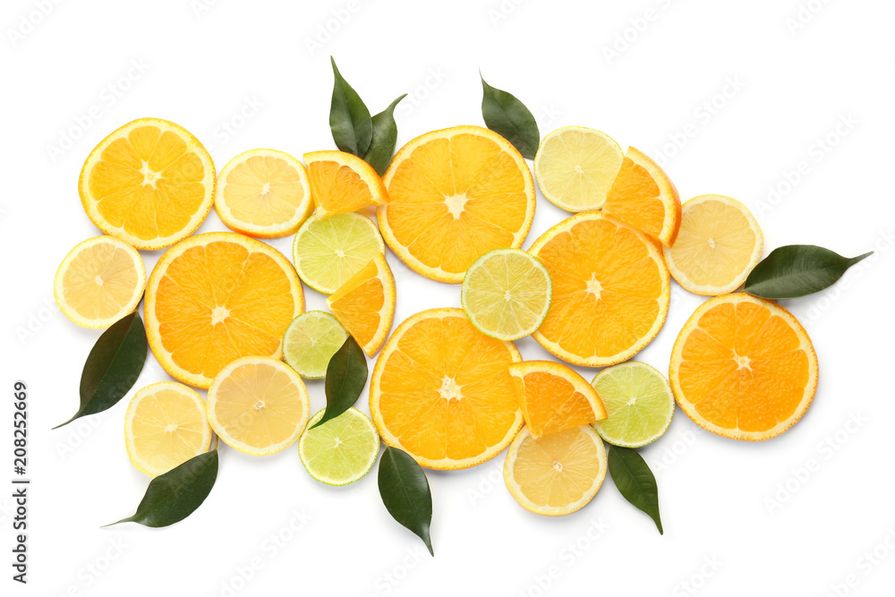 Composition with cut citrus fruits on white background