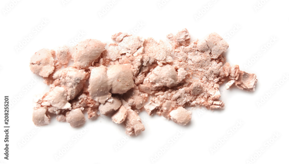 Crushed highlighter on white background. Professional cosmetics