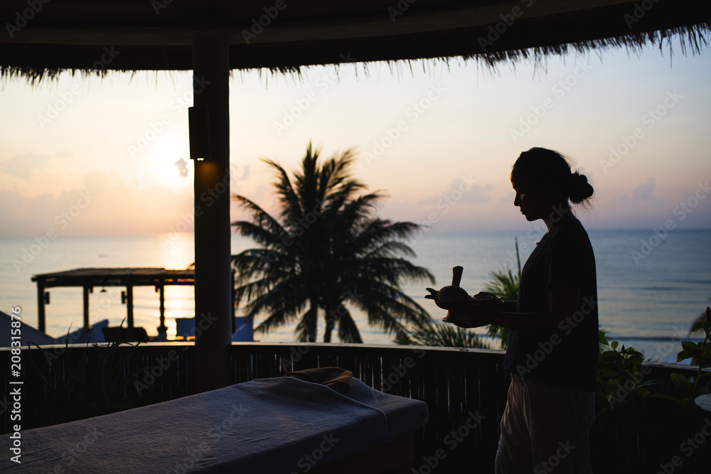 Massage therapist working at a spa