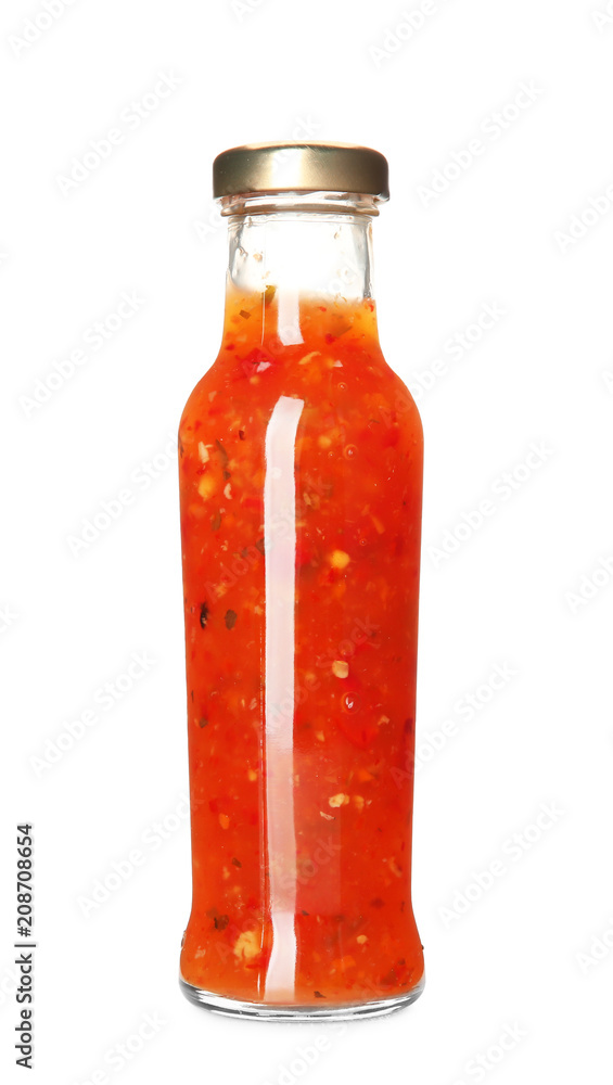 Bottle with tasty sauce on white background