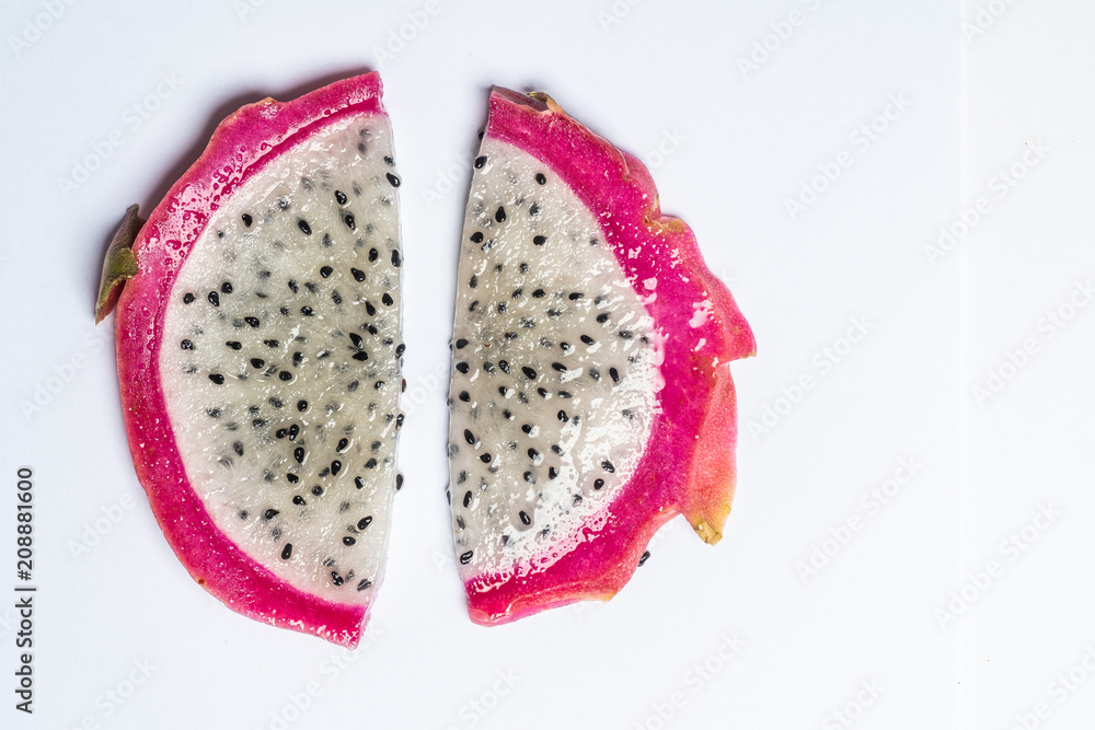 Dragon fruit slices isolated on white background