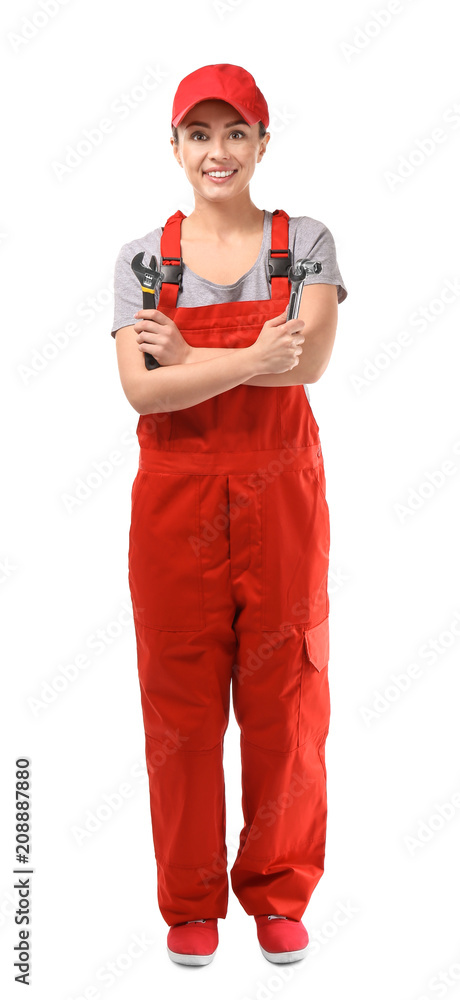 Female car mechanic with tools on white background