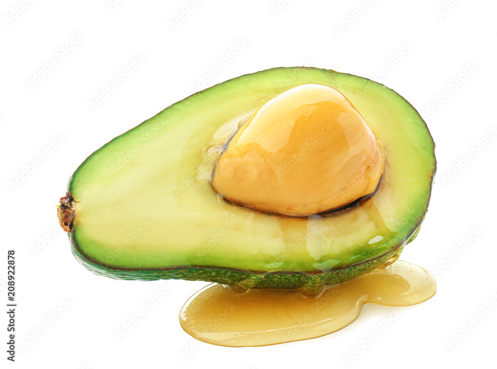 Half of ripe avocado on white background