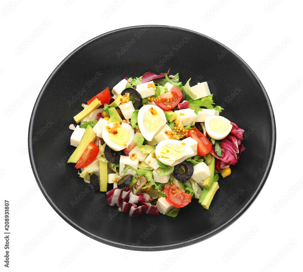 Plate of tasty salad with ripe avocado on white background