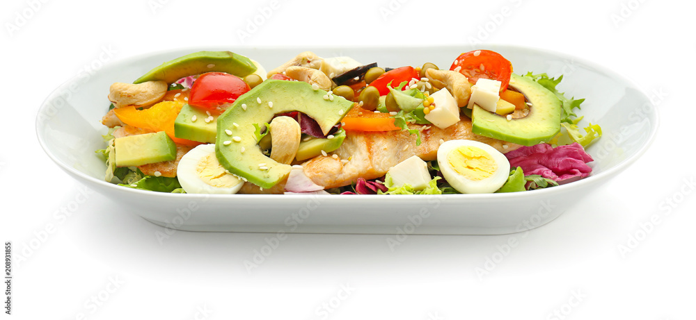 Plate of tasty salad with ripe avocado on white background