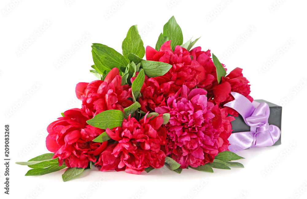 Beautiful peonies with gift box on light background