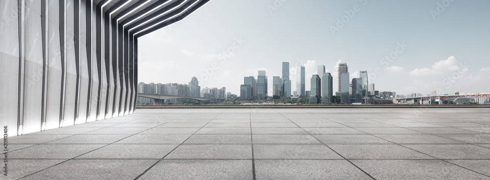 modern building and empty floor with skyline