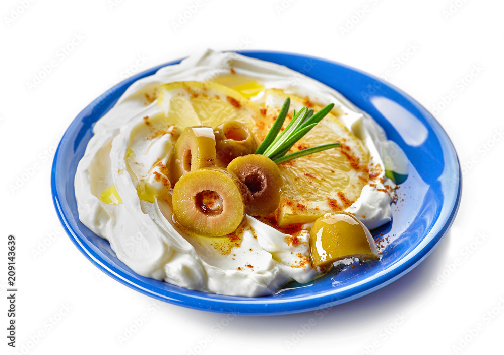 fresh cream cheese with olives and lemon